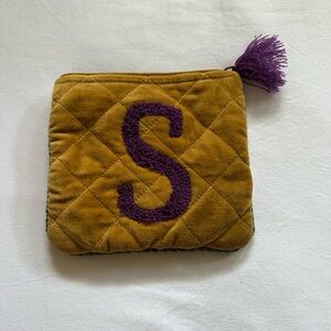 Gold and purple letter S clutch